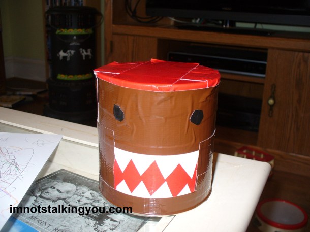 Domo drum, made from duct tape and a toddler snack can