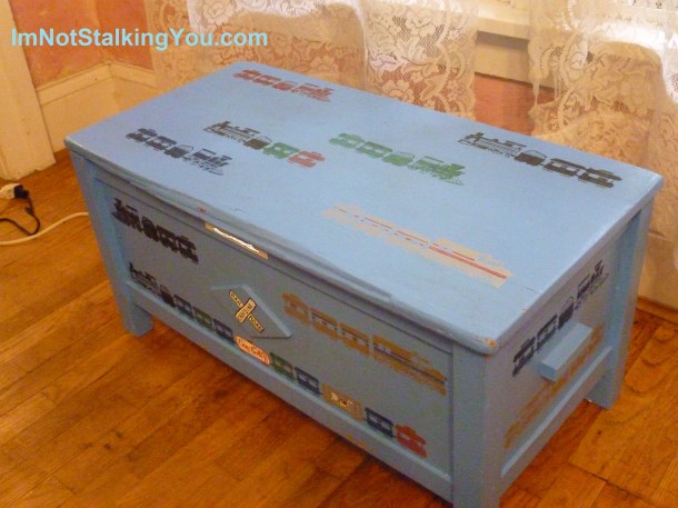 Made this a few years ago, but this toy box would fit into the room as well.