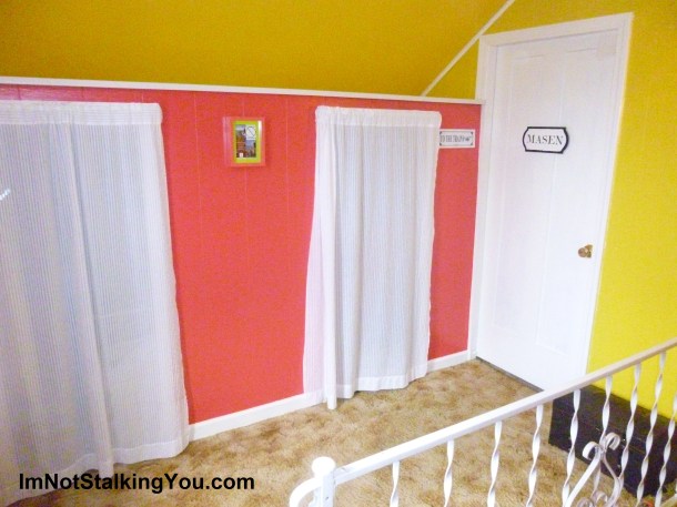 Painted. Carpet removed. Signs outside the bedroom keep the train theme, as well as a trunk that could be waiting to be loaded on a train. Trunk was from Family Dollar, under $20.