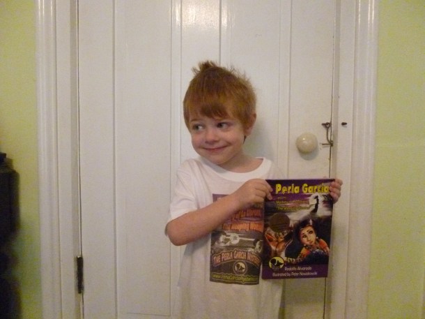 M holding Perla Garcia's first mysterio