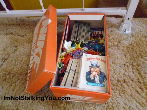 Garbage Pail Kids sharing a box with charms and New Kids on the Block cards